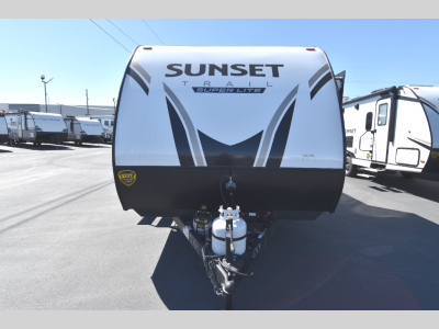 Front view of fiberglass cap, logo, and dual propane tanks
