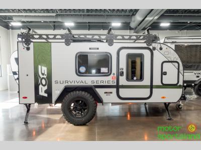 Side view showing door, windows, and rugged off-road tires