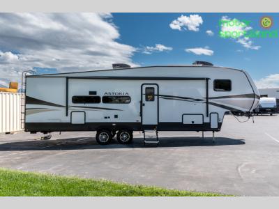 Passenger side full view showing dual axle layout