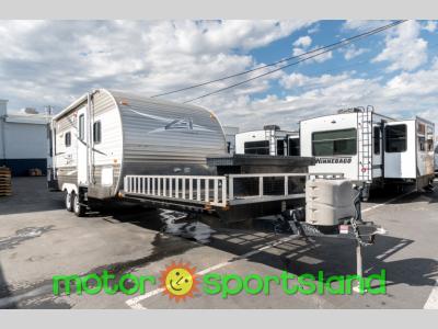 Front roadside angle of the 2014 CrossRoads Z-1 ZT218TD with diamond plate front