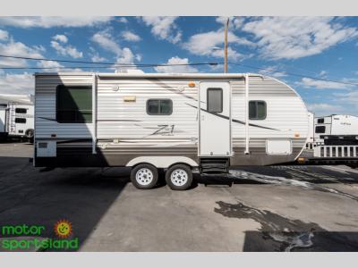 Side view showing full trailer length, windows, and dual axle design