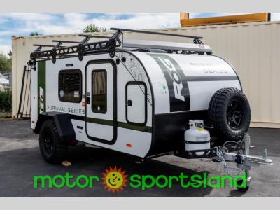 Front angle of 2025 ROG 12RKSS off-road trailer with spare and gear rack