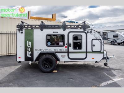 Side view of Survival Series off-road trailer with roof rails and rugged tires