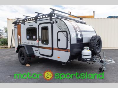 Passenger side view of 2025 ROG 12RKSS off-road trailer with roof rack