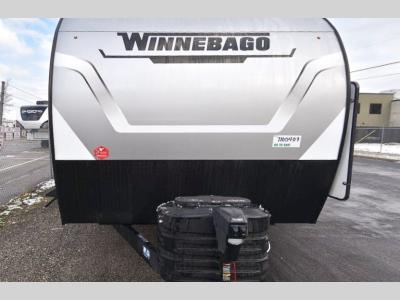 Front head-on view showing Winnebago logo and aerodynamic front cap