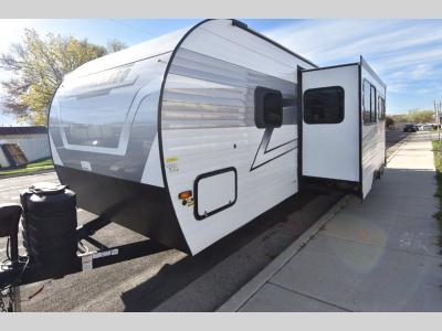 Front passenger side showcasing aerodynamic profile and bold Winnebago branding