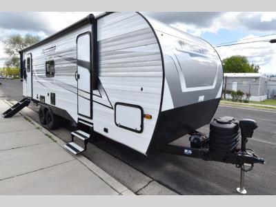 Front angle of 2024 Winnebago Access 26RL travel trailer with black trim