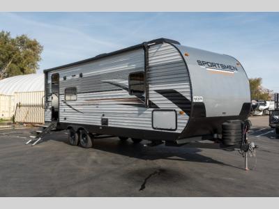 Passenger side of 2025 KZ Sportsmen SE 241RKSE travel trailer with front graphics