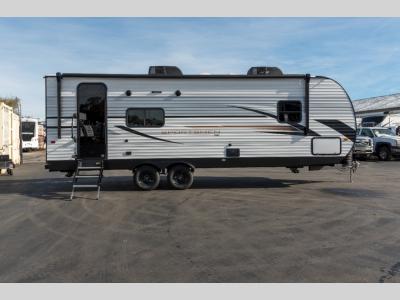 Curbside view showing slideout and windows