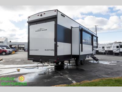 Rear corner with frameless windows and backup camera prep
