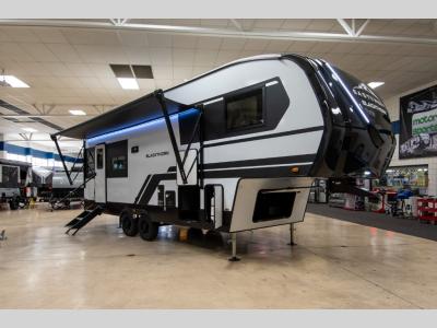 Angled front view of 2025 East to West Blackthorn Half-Ton 26RD fifth wheel at Motor Sportsland