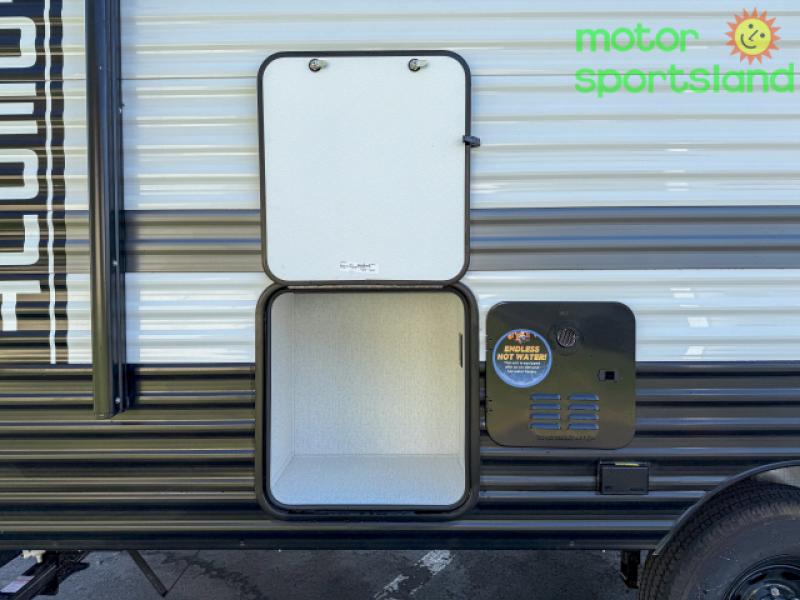 Exterior baggage compartment and water heater access.