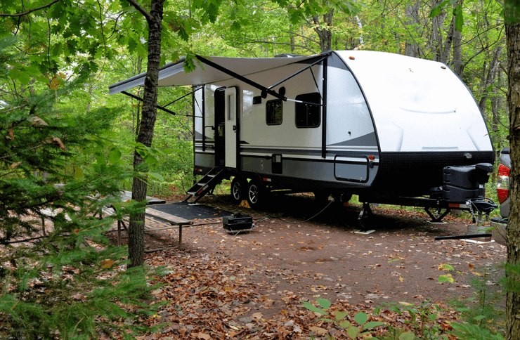 travel trailer in the woods