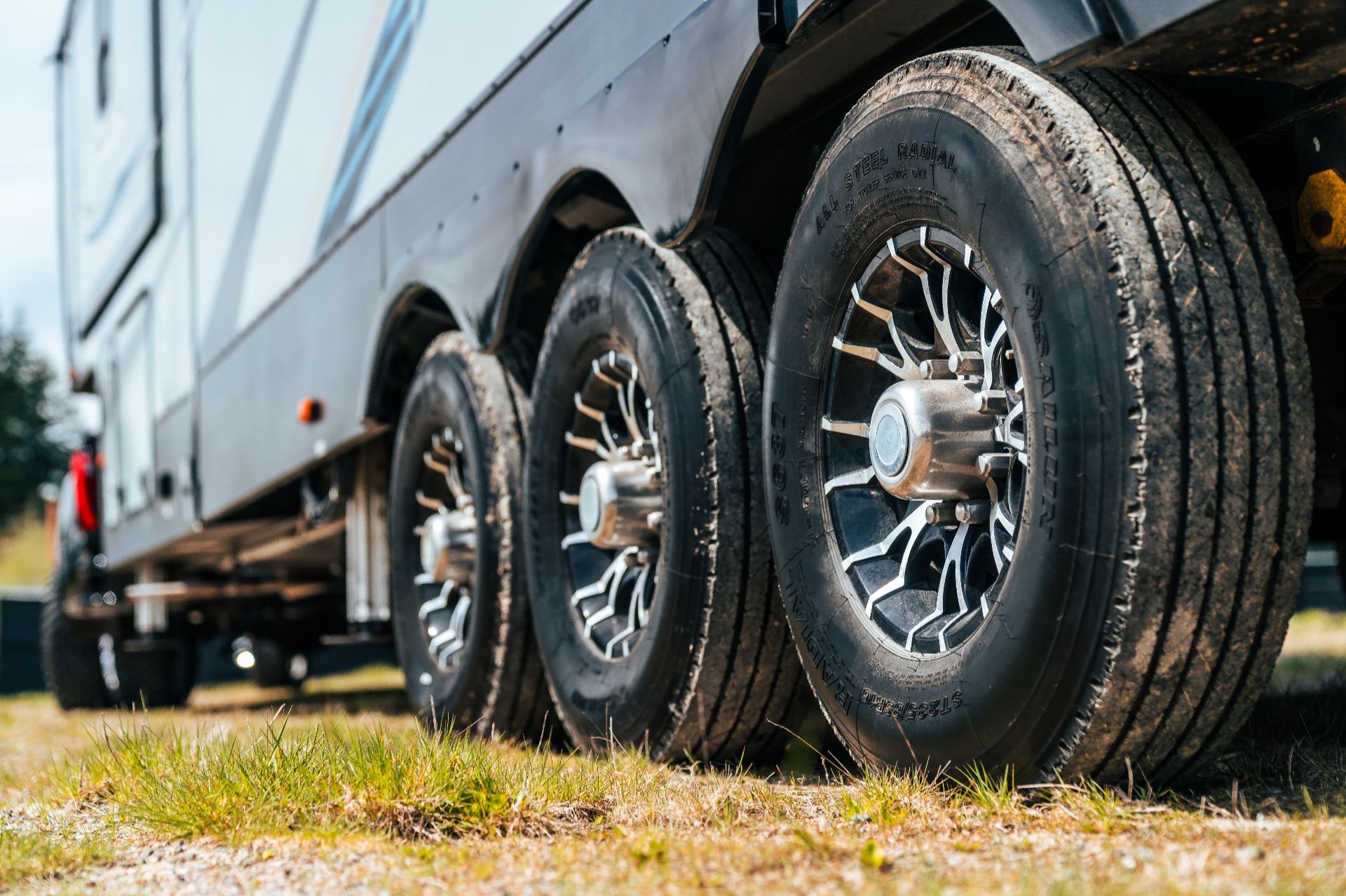 Close up image of an RV's tires.