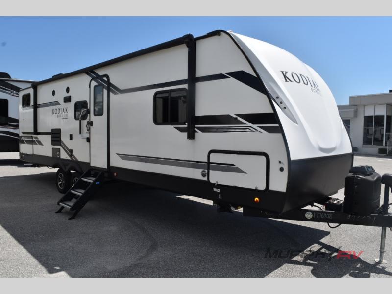 Side view of a used 2021 Dutchmen RV Kodiak Ultra-Lite 296BHSL