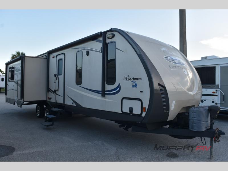 Side view of a Used 2015 Coachmen RV Freedom Express Liberty Edition
