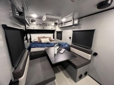 queen bed and dinette