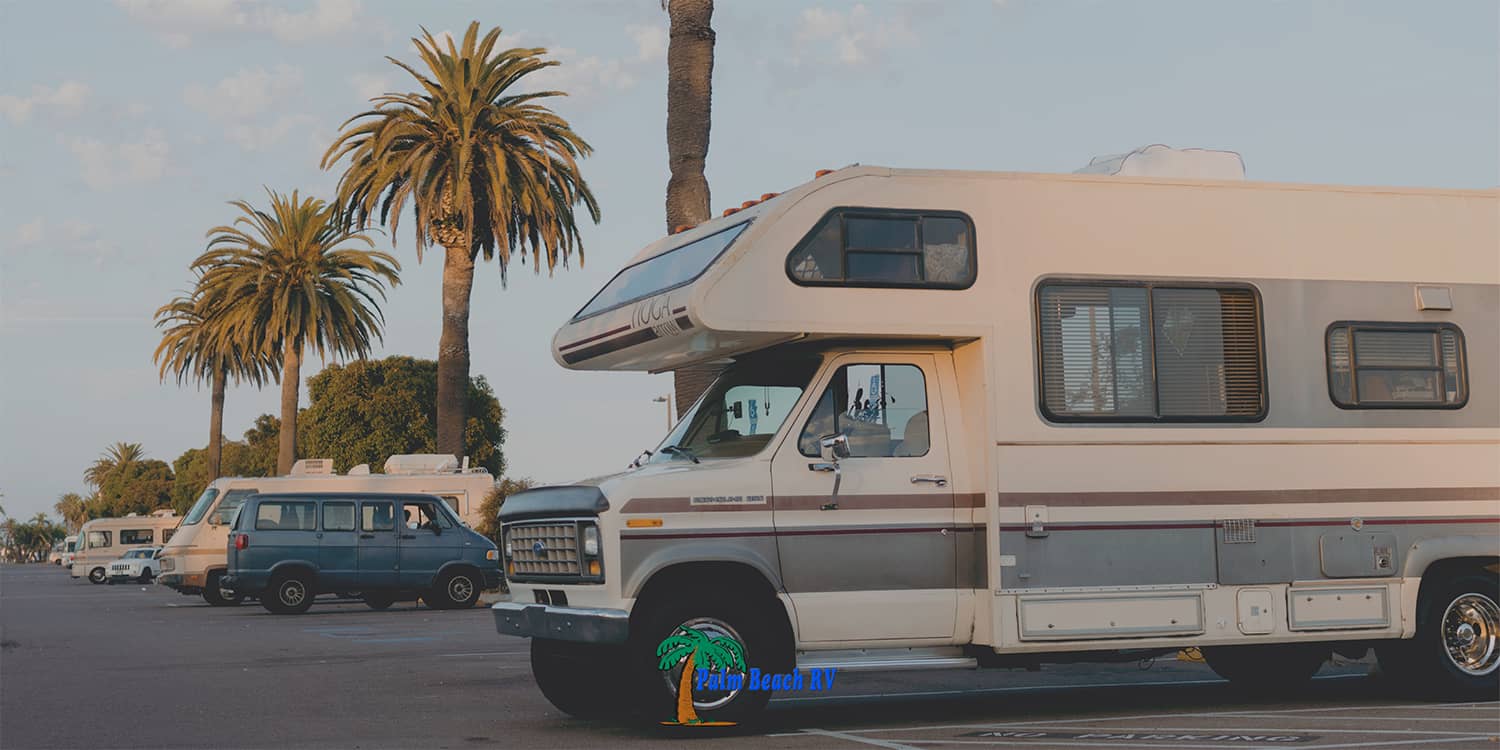 RV in front of palm trees