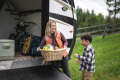 couple sitting inside their RV