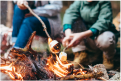 Kids around campfire