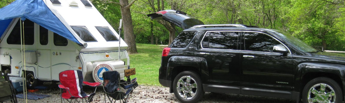 Tow vehicle pulling Aliner Camper