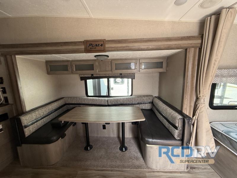 Used 2019 Palomino Puma XLE Lite 29FQC Toy Hauler Travel Trailer