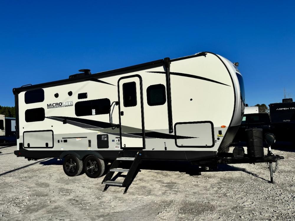 Used 2023 Forest River Flagstaff Micro Lite 25BRDS travel trailer exterior with awning at Recreation USA in Longs SC