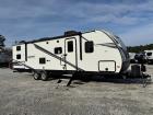 Used 2020 CrossRoads Sunset Trail SS289QB travel trailer exterior profile with power awning and slide-out extended.