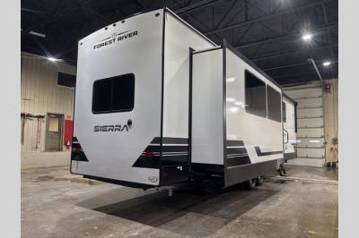 Rear exterior view highlighting large windows and destination-style design.