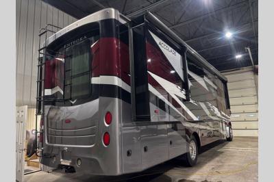 Rear exterior view with full-body paint and integrated storage compartments.