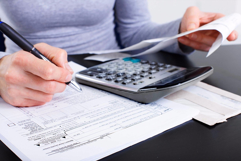 Woman looking through finances