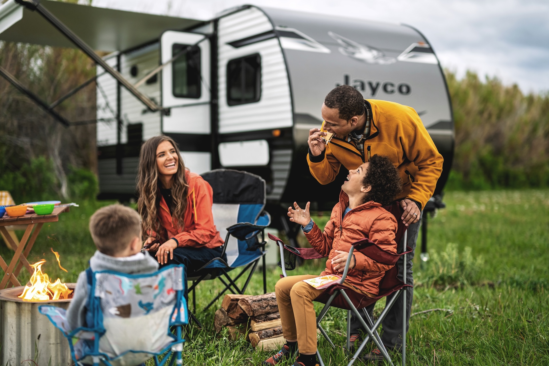 Family enjoying their time together in the great outdoors with the help of their RV