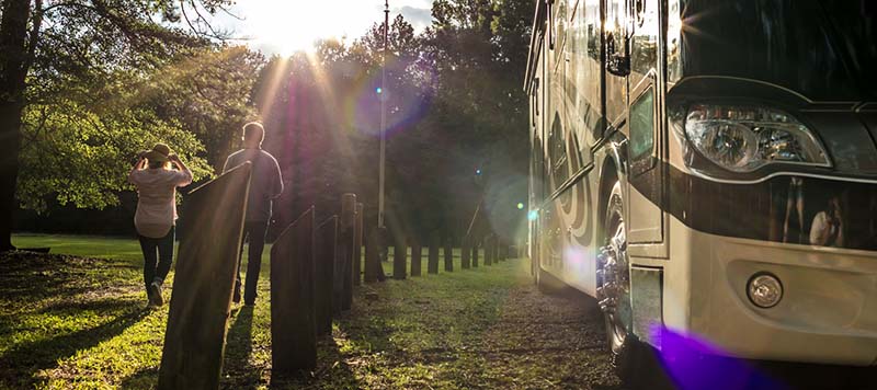 Couple beside motorhome