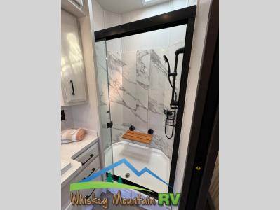 SHOWER WITH TEAK SEAT AND 8' CEILING HEIGHT